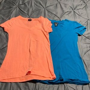 Juniors wet seal 2 shirts, one Medium, one large. Cotton and spandex